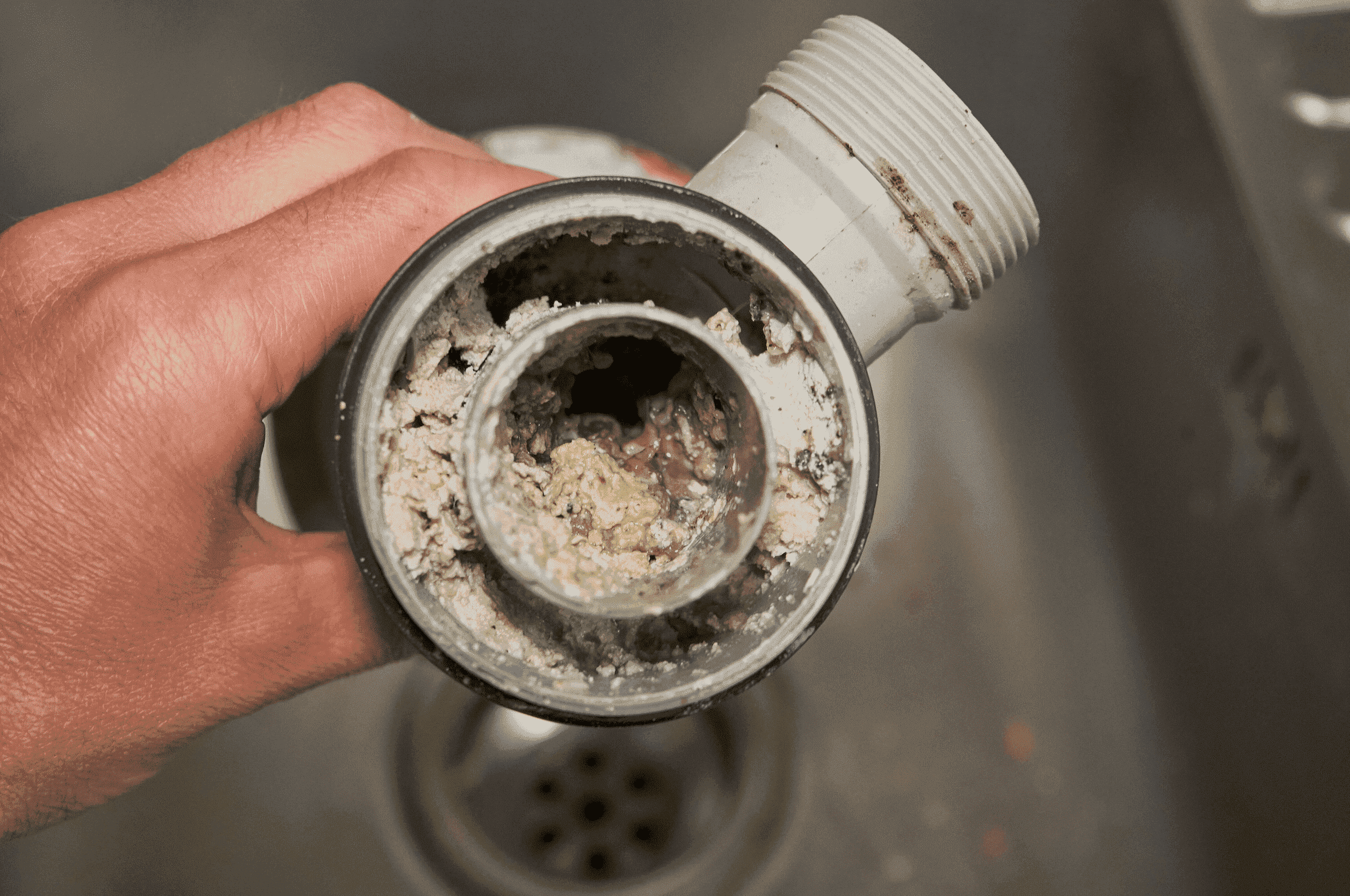 Fat, oil and grease build up in drain pipe