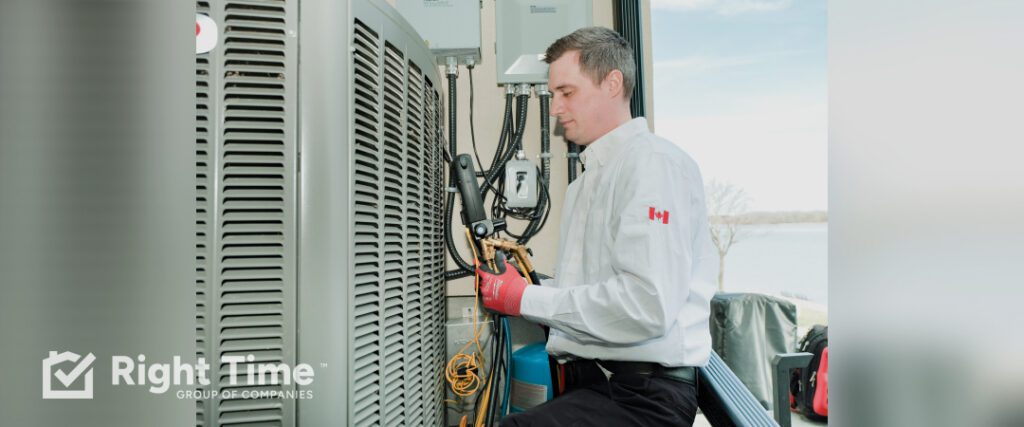 Technician inspecting an outdoor air conditioner condenser during seasonal maintenance.